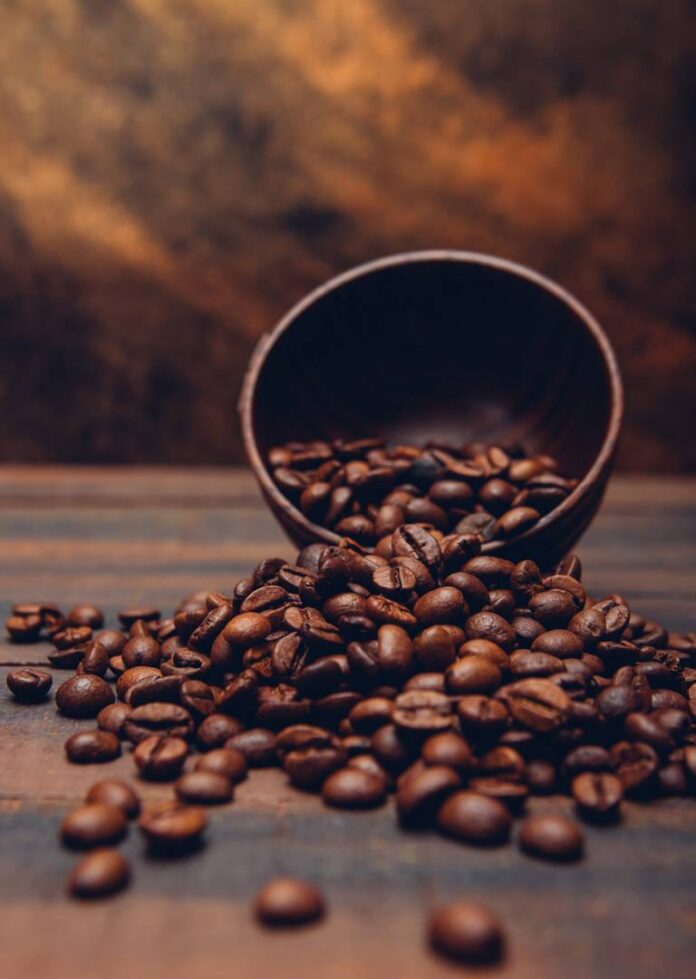dark-coffee-beans-bowl-brown-table_wp